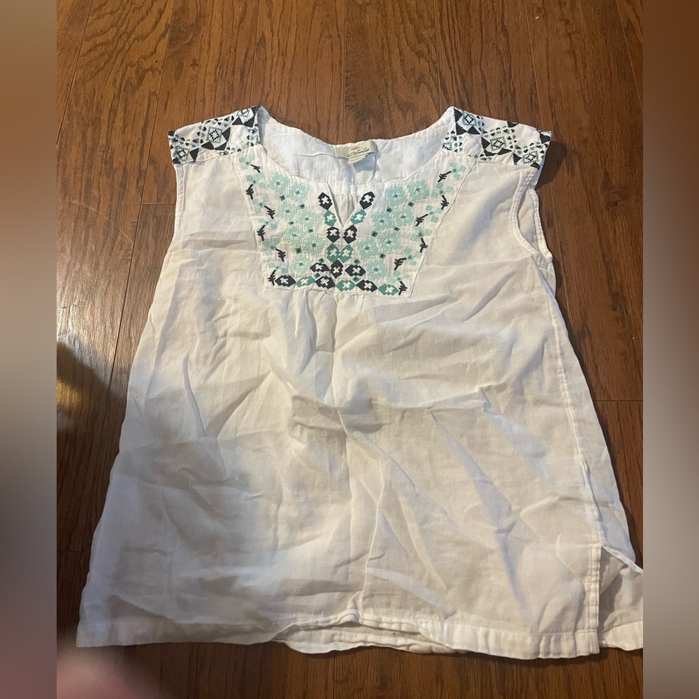 White Sleeveless Top with Embroidered Design